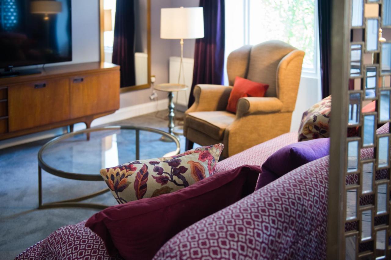 One Devonshire Gardens A Hotel Du Vin Glasgow Dış mekan fotoğraf A living room at the Hotel Indigo in San Francisco